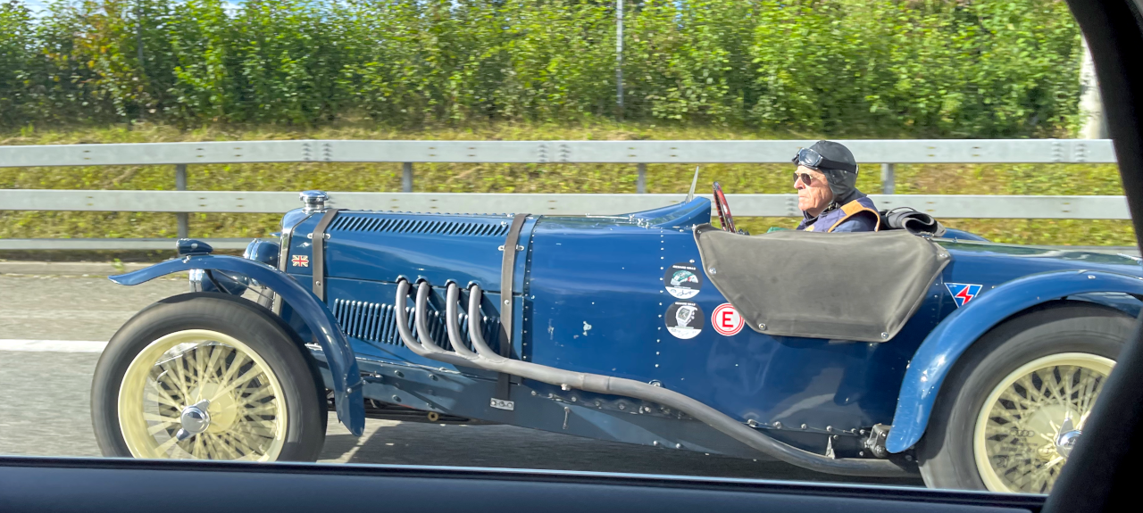 old blue open top sports car