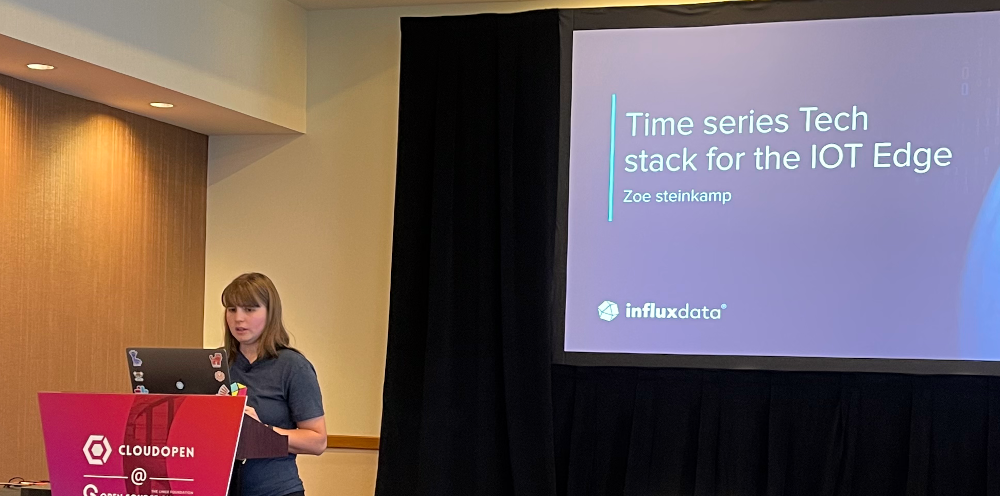 A picture of Zoe Steinkamp presenting on InfluxDB